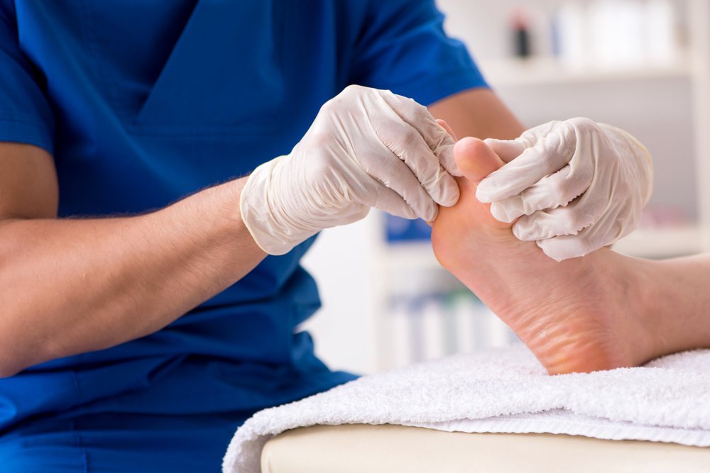 Podiatry services in San Diego – podiatrist examining a patient's foot